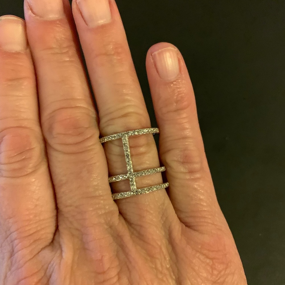 Charming Charlie silver tone and rhinestone ring.